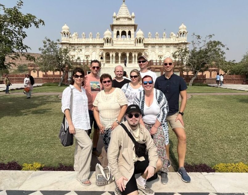 Foreign tourists taking photos in front of Amer Fort during Jaipur Same Day Tour