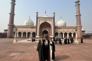 Tourists standing at Jama Masjid during 2 Days Delhi Tour Package