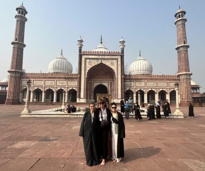Tourists standing at Jama Masjid during 2 Days Delhi Tour Package