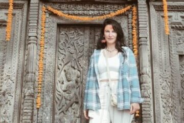 Foreigner woman at Khajuraho temple during Golden Triangle with Khajuraho and Varanasi tour India