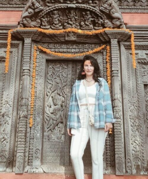 Foreigner woman at Khajuraho temple during Golden Triangle with Khajuraho and Varanasi tour India