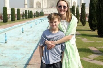 Tourist family visiting Taj Mahal on same day train tour from Delhi