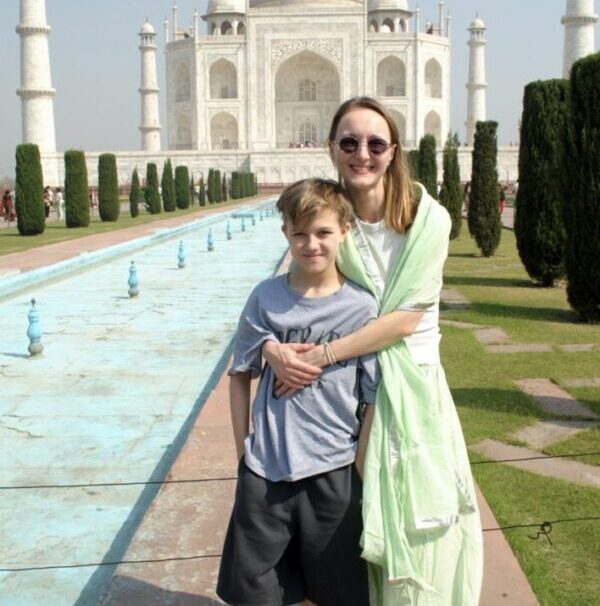 Tourist family visiting Taj Mahal on same day train tour from Delhi