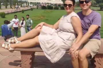 Couple sitting together at Taj Mahal during romantic Taj Mahal tour in Agra India